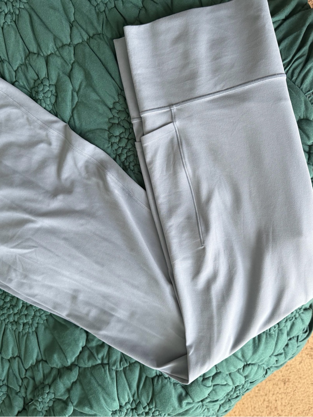 Athleta salutation stash flare pants XL